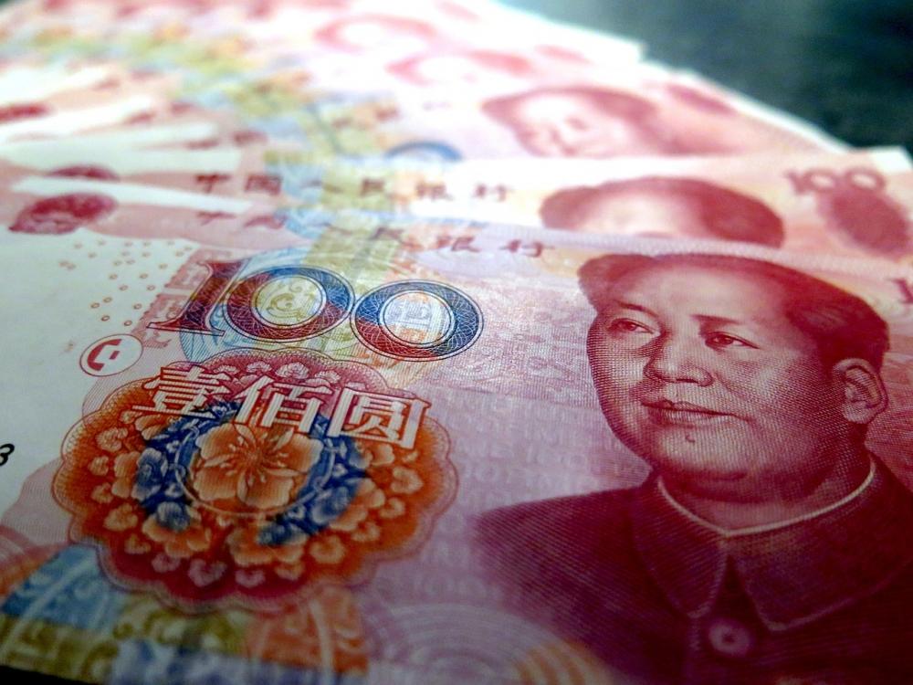 monex-chinese-yuan-reageert-nauwelijks-op-neerwaartse-bijstelling-economische-groei-china_1_Ksj3Q8.j